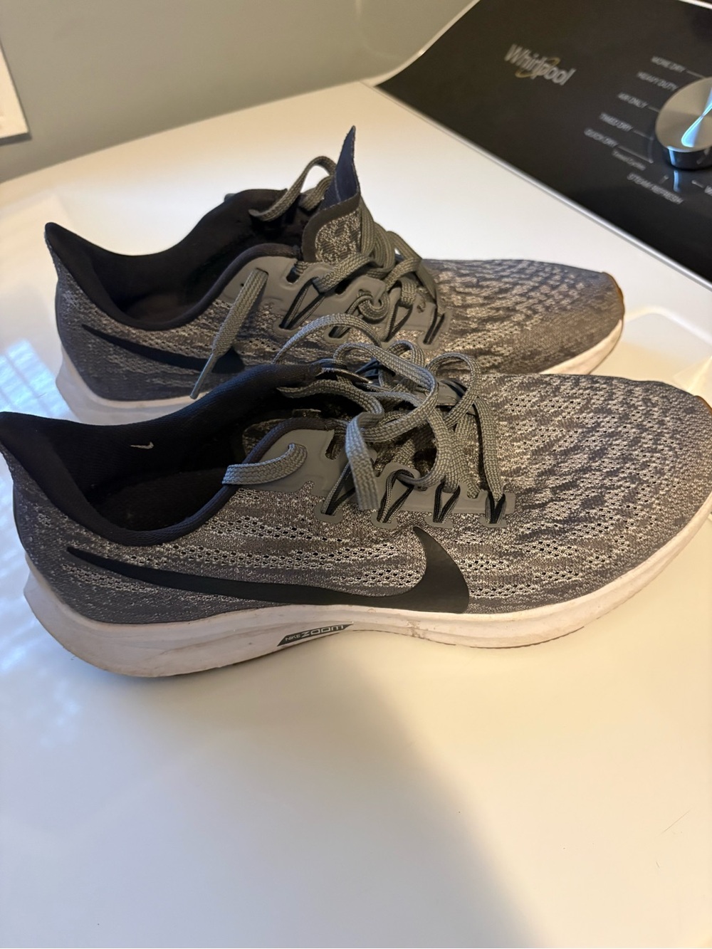 Nike women’s Gray and Black Knit Running Shoes